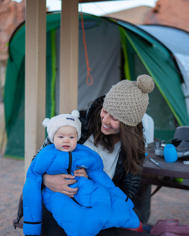 The author with her baby in a baby sleeping bag