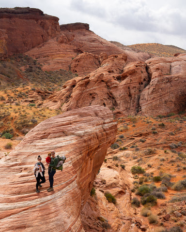 Family hiking through Valley of Fire