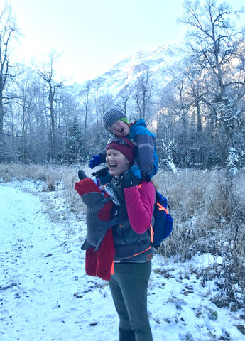 The author hiking with two children